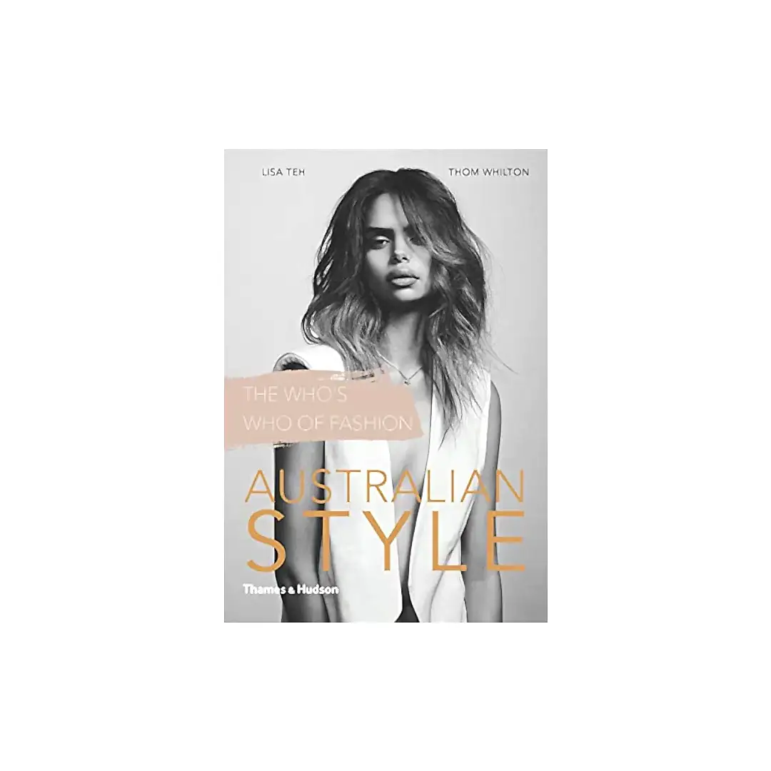 Cover of "Australian Style" by Thomas & Hudson, presented by Flowers on Norton St, showcasing a black-and-white photo of a woman with long hair in a vest. The text reads "The Who's Who of Fashion," highlighting Australian fashion and featuring influential design talent.