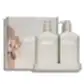 Two bottles of AL.IVE BODY | Earth Collection Duos Hand & Body Wash and Lotion from Flowers on Norton St in beige containers with pumps are elegantly displayed on a matching tray. A dried floral arrangement complements the backdrop. The products, made with natural ingredients, are labeled "Sea Cotton & Coconut.