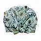 A fashionable shower cap by Flowers on Norton St, adorned with a botanical pattern of yellow and green leaves on a light blue background, featuring a prominent bow at the front.