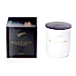 A white jar candle with a black lid, labeled "Flowers on Norton St," stands beside its matching black box, showcasing "Sohum Gardenalia Candles" in gold text. Crafted from eco-friendly soy wax, these candles provide an impressive burn time while embodying minimalist elegance.