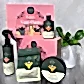 On the table, you can see a collection from the Plant Lovers Gift Set by FlowersonNortonSt. The items include a pest spray bottle, a growth concentrate called "grow," and both a pouch and tub labeled "support." Behind them is a pink sign adorned with plant illustrations that reads "Love, Your Plants.