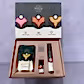 The We The Wild - Plant Care box set by FlowersonNortonSt, ideal for plant care enthusiasts, comprises a pouch, roller bottle, and small bottle. The box cover features abstract designs and highlights that the products are organic, safe for pets, vegan, and plant-based.