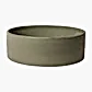 The Robert Gordon | Wheel Bowl by FlowersonNortonSt is a wide, shallow stoneware bowl in light green, showcasing a smooth matte finish and simple design. It features a thick, slightly curved rim and is displayed empty against a plain white background.