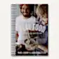 The cover of "The Blue Ducks' Real Food" from FlowersonNortonSt highlights modern Australian cuisine by Mark Labrooy and Darren Robertson. It displays a striped spine and a photograph of two individuals savoring a sustainable meal, with one person holding a bowl and spoon.