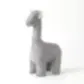 A gray fabric giraffe plushie from FlowersonNortonSt's Animal Book Ends collection stands against a plain white background, featuring minimalist designs with small horns and a simply stitched face, which enhance its charming and cuddly appeal—ideal for those who cherish whimsical giraffe plushies in their collection.